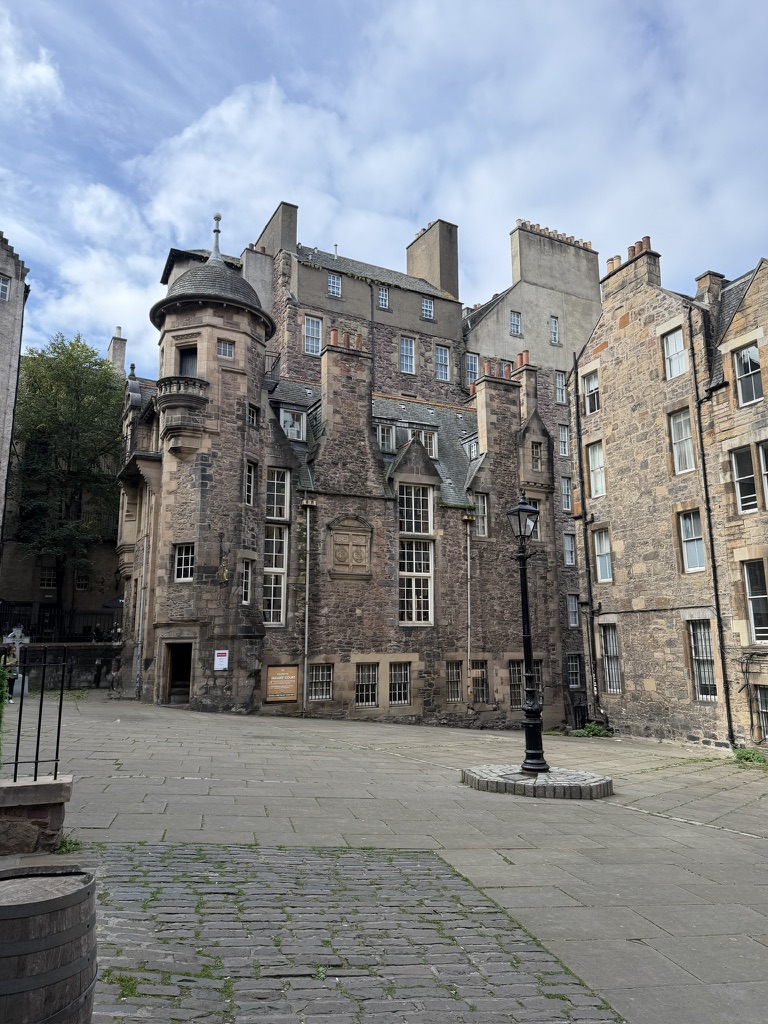 The Writers’ Museum courtyard in Edinburgh, surrounded by historic stone buildings.